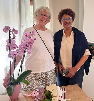 Elisabeth Mach-Hour und Freiweini Zerai (Leitung Geschäftsstelle München)